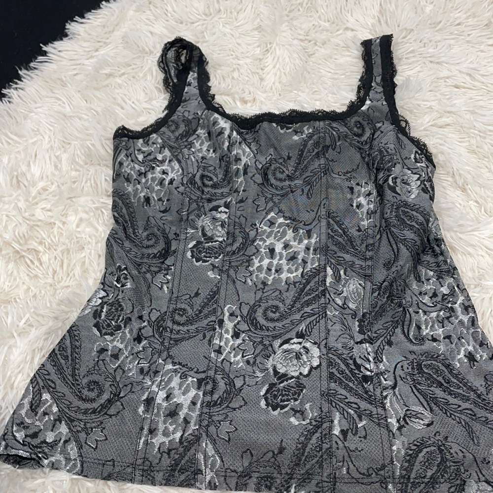 Very flattering and sexy sleeveless top size s